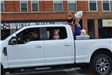 Cheerleaders in truck in parade
