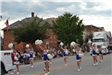Cheerleaders walking in parade