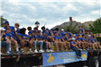 Football kids on trailer in parade