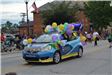 Decorated car with balloons in parade