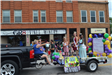Girls with crowns on float in parade