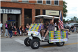 Decorated golf cart in parade