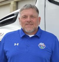 Man standing by truck