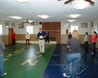 People Standing on Mats